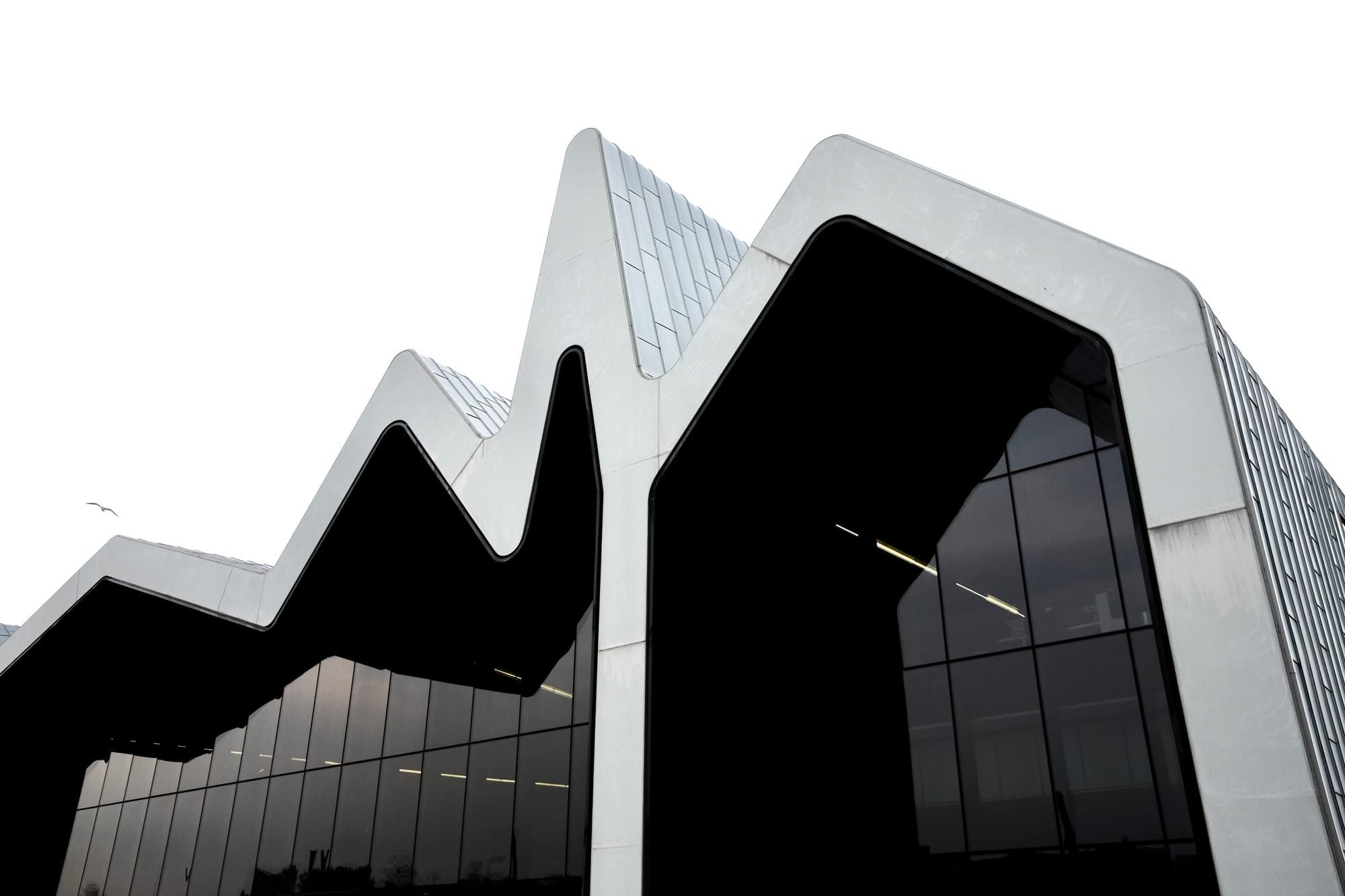 The curved, wave-like metal roof of the Riverside Museum in Glasgow